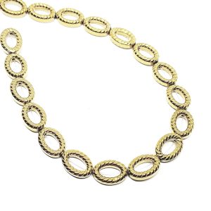 Filo di Ematite di forma Ovale Lavorata Oro 10x13mm